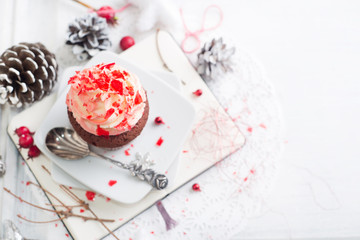 Cupcake with white and red cream