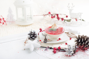 red fruit Panacotta with green mint leaves