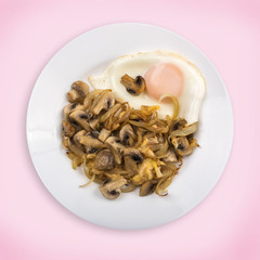 Fried eggs with onions and mushrooms
