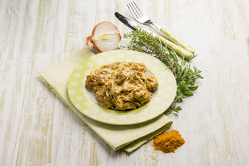 stew chicken with  curry and herbs