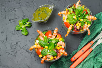 Fresh salad with shrimps, tomatoes, sweet pepper, corn and lettuce