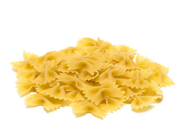 heap of  bow tie pasta isolated on white background