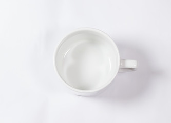 empty porcelain mug isolated on white background