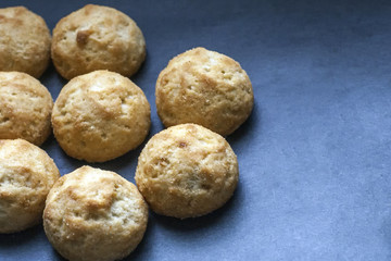 Fresh homemade cookies on a dark blue background