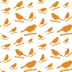 Obraz premium Birds pattern. Vector seamless pattern with hand drawn silhouettes of birds on a tree branch.