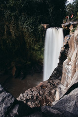 Big waterfall in green forest at summer. Bali, Indonesia