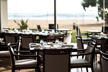empty restaurant with served tables