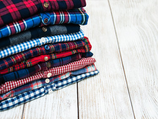 stacks of checkered shirts
