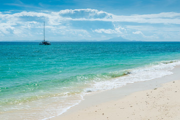 Fototapeta na wymiar beautiful landscape - turquoise water, white sand and boat in the sea, Poda island, Thailand