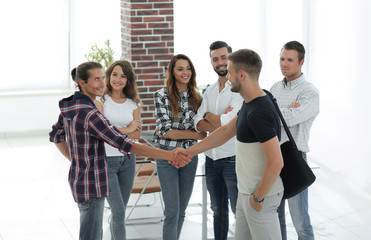 handshake Manager and customer in the office.