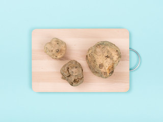 Sweet potatoes on a chopping board