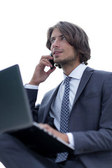 closeup.serious businesswoman talking on the smartphone