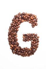 Alphabet G of coffee beans isolated on white background