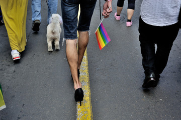 Flag and feet of the Pride Parade participants
