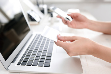 Woman making a purchase with a card