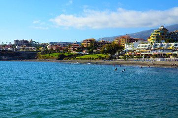 View on Playa de Torviscas and Playa de Fanabe beach in Costa Adeje,
Tenerife,Canary Islands,Spain.Travel or vacation concept.Selective focus.