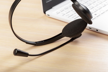 headset on keyboard computer laptop