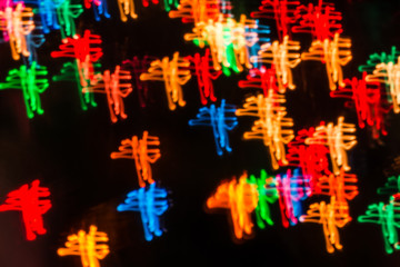 Abstract background with lights in blurred motion in the night or fireworks in new years eve