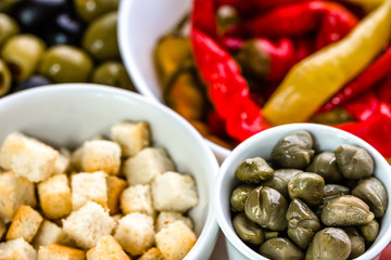 Bowl of capers, italian antipasti, traditional food from italy or mediterranean cuisine ingredient
