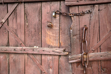 Fragment of closed wooden gate