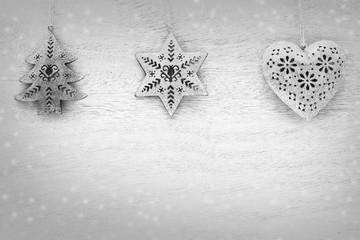 Christmas decorations on a wooden background with vintage effect