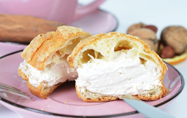Freshly baked sweet delicious cream cookie was cutted in a plate, selective focus