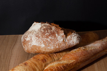 French bread on a black background