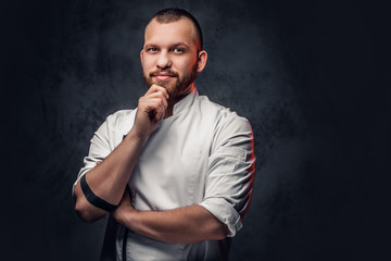 Portrait of bearded chef cook.