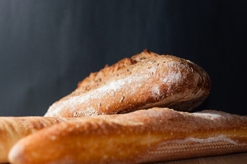 French bread on a black background