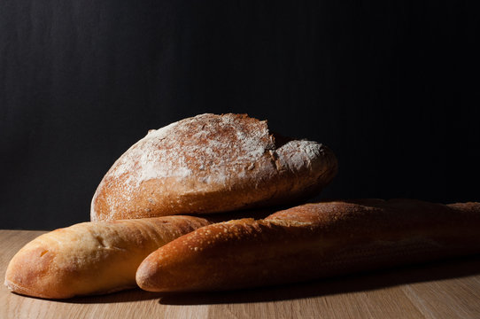 French bread on a black background