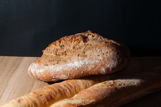 French bread on a black background