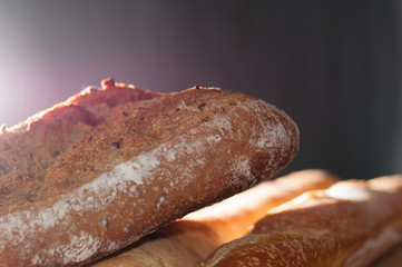 French bread on a black background