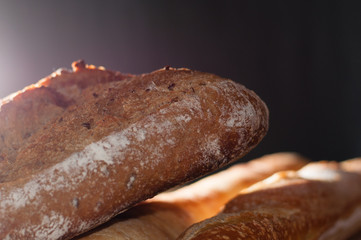 French bread on a black background