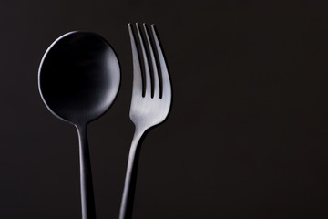 black fork and spoon