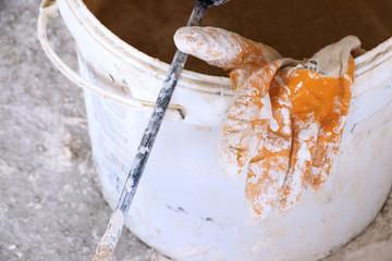Plaster mixer bucket and glove