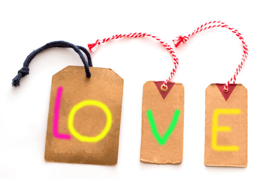 Label with the word love gift greeting card on white background, Encourage Concept, Love text message with tags label.
