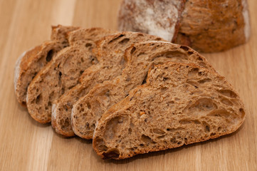 sliced French black bread with seeds