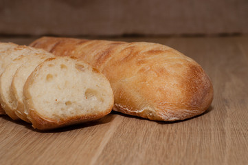 Ciabatta on a wooden board with space for text