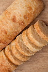 Ciabatta on a wooden board with space for text