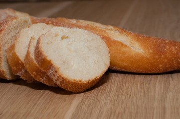 French loaf on a wooden board with space for text