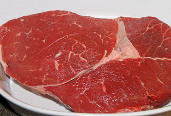 Lean cut of Beef in casserole dish ready for cooking
