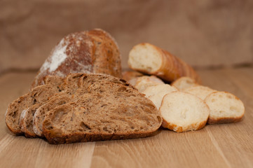 Bread chopped on wooden board with space for text
