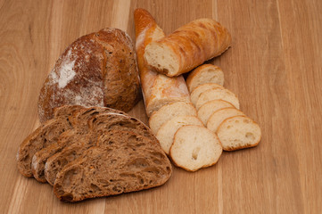 Bread chopped on wooden board with space for text