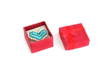 Ring in the form of heart with jewels in a gift box. Happy Valentine's Day. Valuable Jewellery. Isolated with plenty of room for your text.