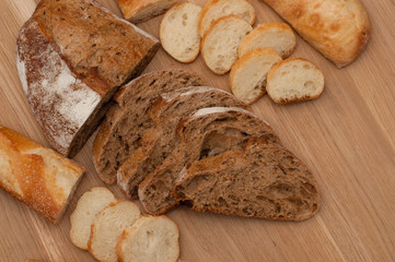 Bread chopped on wooden board with space for text