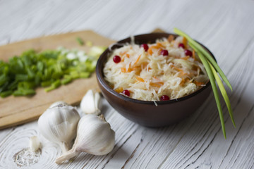 sauerkraut, onion, garlic on the table