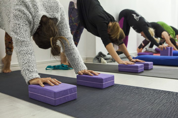 Yoga therapy class with props