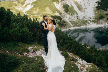 Wedding couple near the dragon lake 