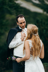 Wonderful wedding couple at the summer 