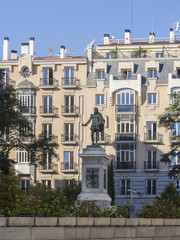 Fototapeta na wymiar Statue of Cervantes in the Plaza de las Cortes. Madrid, Spain.